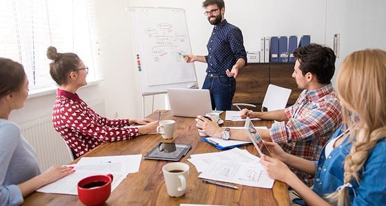 Executive presenting a strategy to colleagues